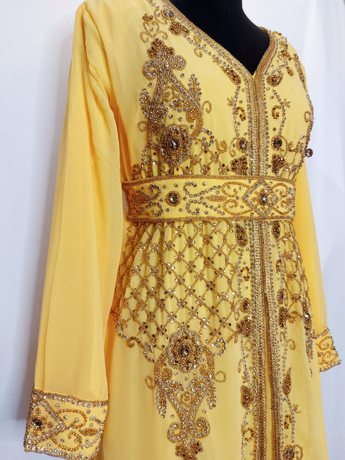 Yellow luxurious Moroccan Kaftan With Sun-proof hijab.