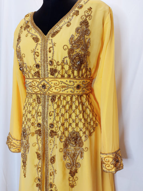 Yellow luxurious Moroccan Kaftan With Sun-proof hijab.
