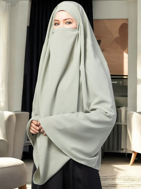 Sea-green plain color khimar with attached mouthpiece.