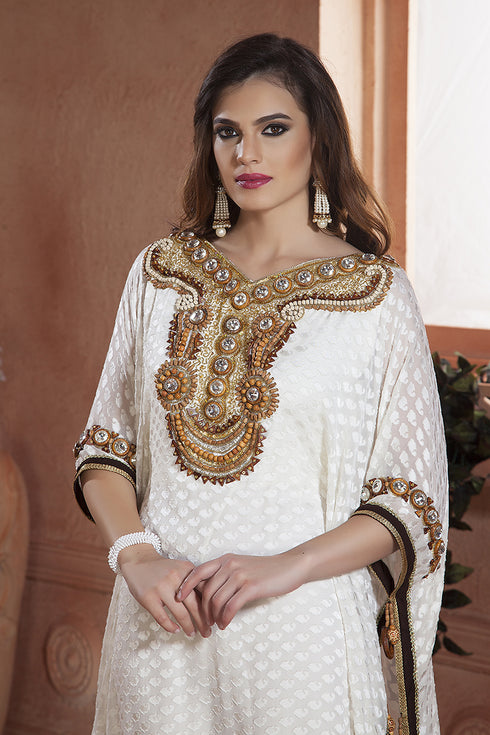 Off white wood work hand beaded partywear dubai kaftan