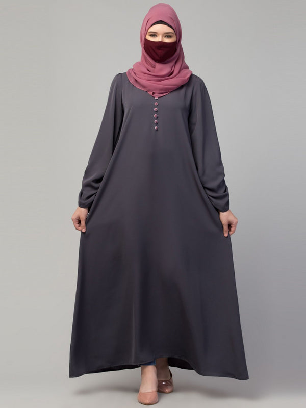 Simple yet stylish abaya in premium stretchable praada fabric with fabric buttons