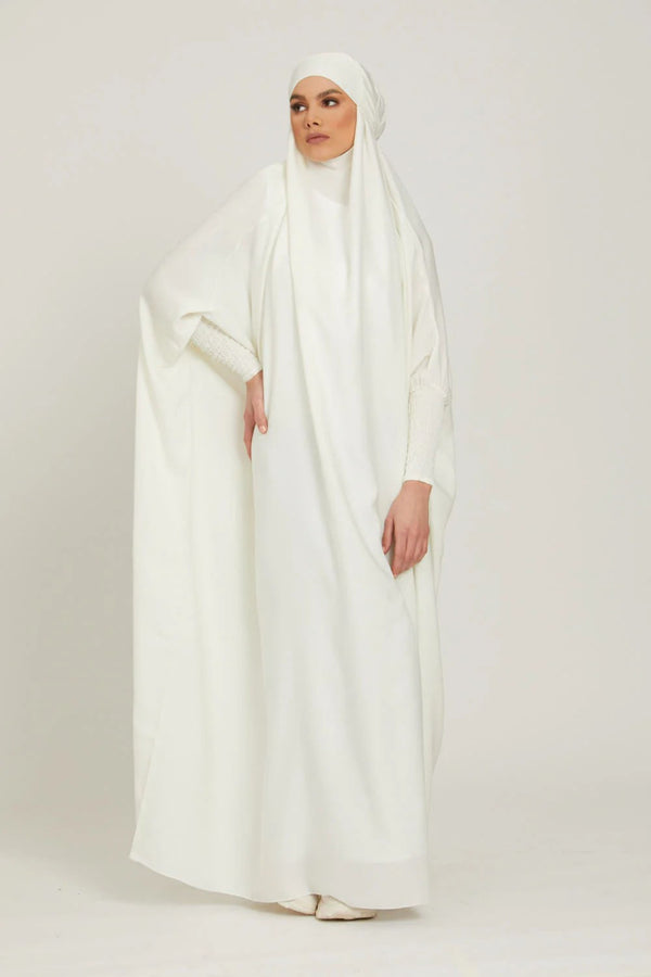 White one piece jilbab in firdaus with smocky sleeves and attached mouthpiece