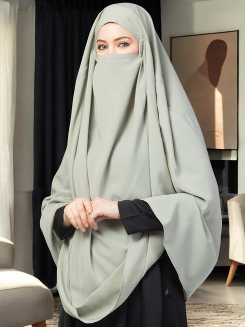 Sea-green plain color khimar with attached mouthpiece.